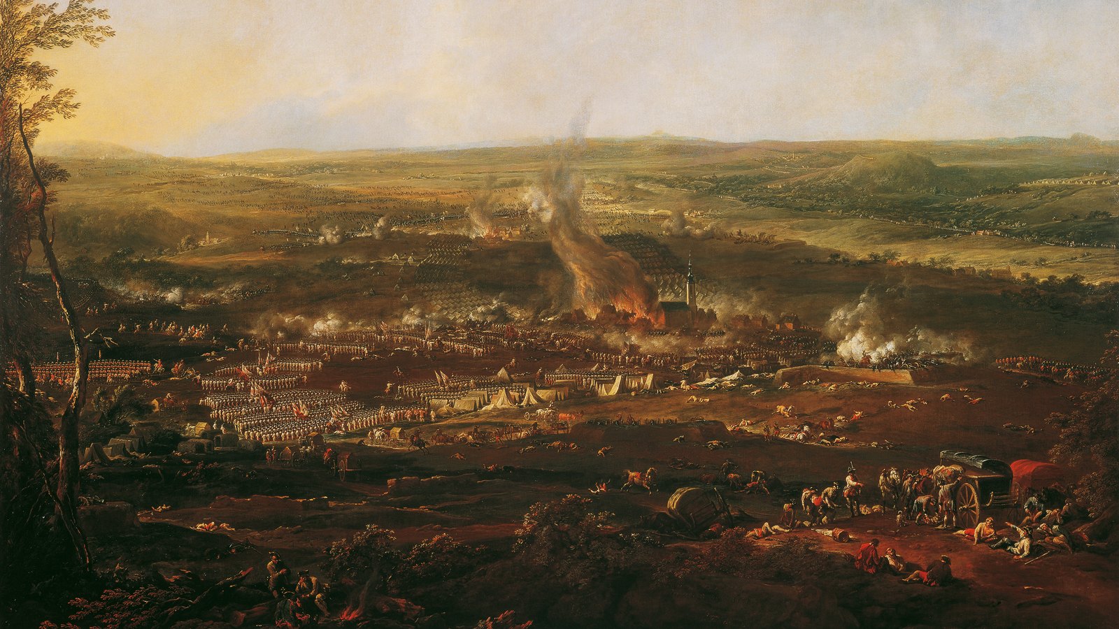 Eighteenth-century panoramic painting of a broad valley at dawn, with a burning village and church tower in the center, rows of white tents and infantry lines, and wounded men and a wagon in the foreground