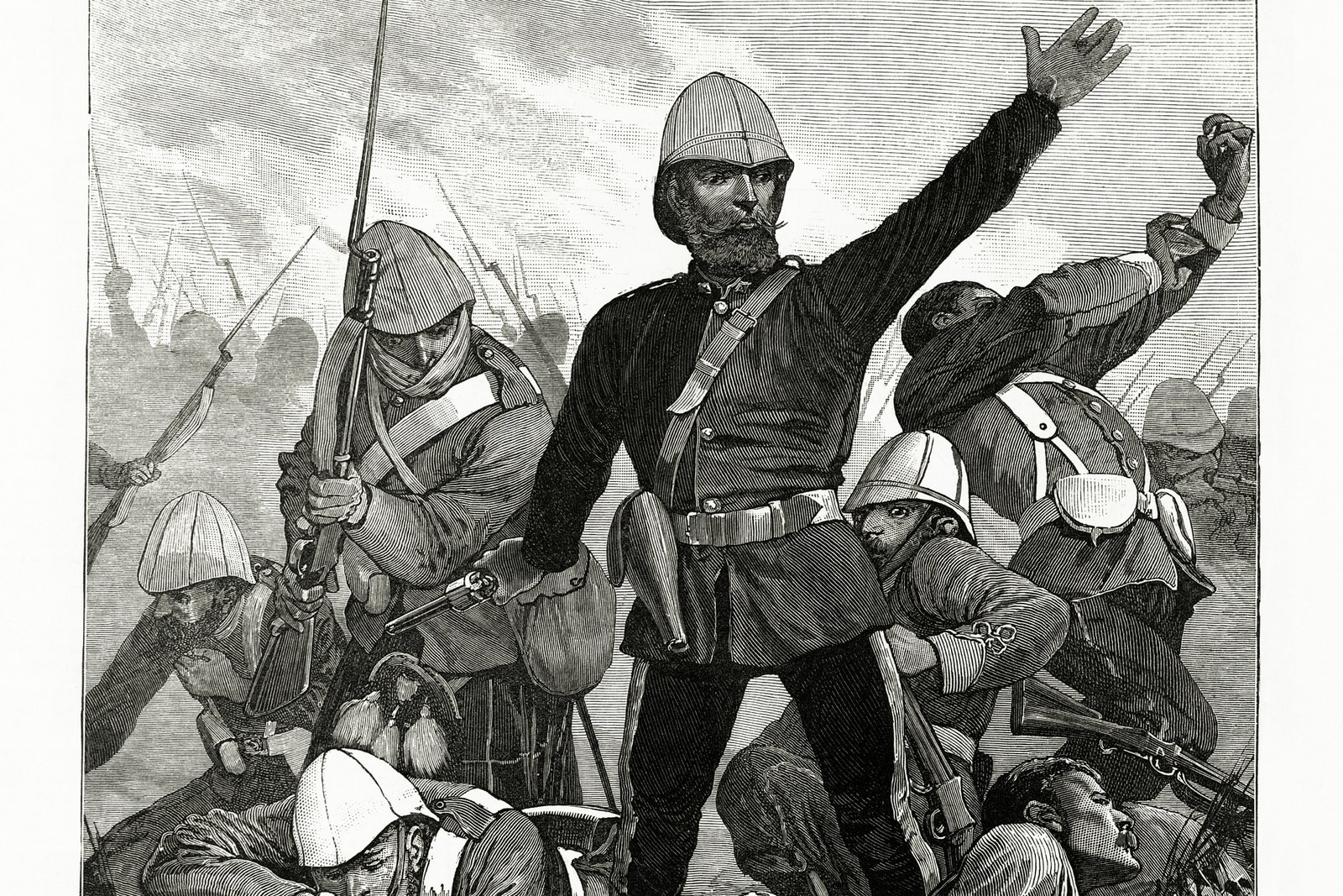 Black and white wood engraving: Major General Sir George Colley, in a sun helmet and dark tunic, stands on the rocky summit of Majuba Hill with his right arm raised, while British soldiers in white helmets crouch, kneel and fire among the rocks around him and smoke drifts behind.