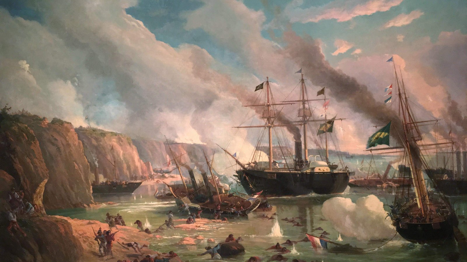 Painting of a black steam frigate flying Brazilian flags amid smoke on a river below red cliffs, with wrecked ships and men struggling in the water.