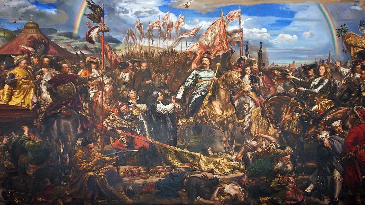 Polish winged hussars charging down a wooded slope toward a besieging army, the victory of Jan III Sobieski
