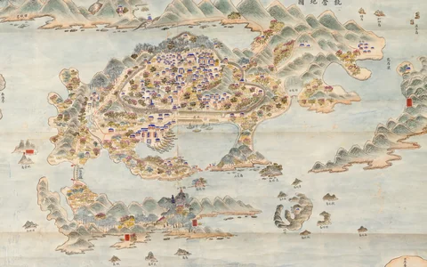 Hand-painted Korean map of 1872 showing the walled naval town of Tongyeong among green hills, the sea around it and a curving island with a hall to the lower right