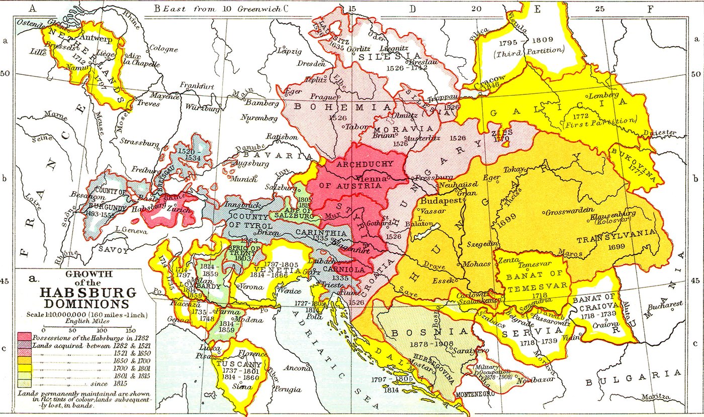 Barwna mapa historyczna Europy Środkowej pokazująca rozrost ziem Habsburgów: Arcyksięstwo Austrii i Styria w głębokiej czerwieni pośrodku, Czechy i zachodnie Węgry w różu, późniejsze nabytki, takie jak Węgry, Siedmiogród i Galicja, w pomarańczu i żółci, a posiadłości włoskie i niderlandzkie obwiedzione żółtymi pasami.