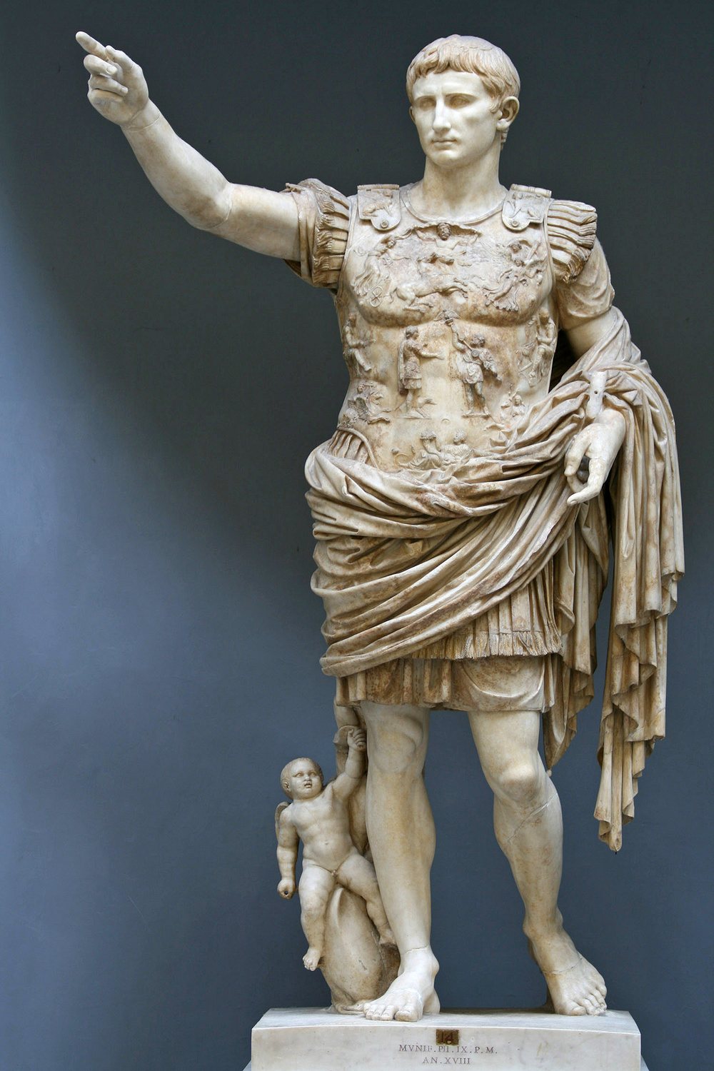 Marble statue of Augustus in armour with his right arm raised
