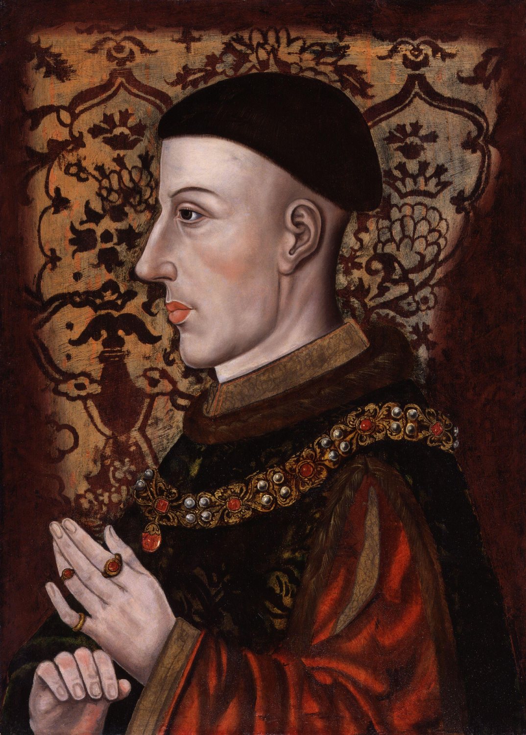 Profile portrait of King Henry V with short dark hair against a patterned background
