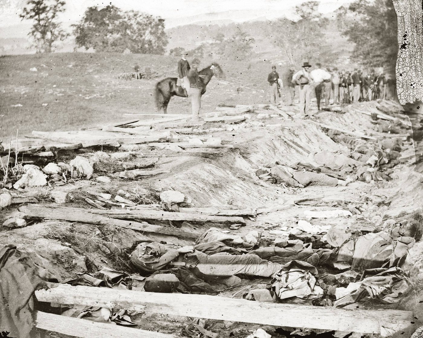 Bodies of Confederate soldiers lying in a sunken farm lane in 1862