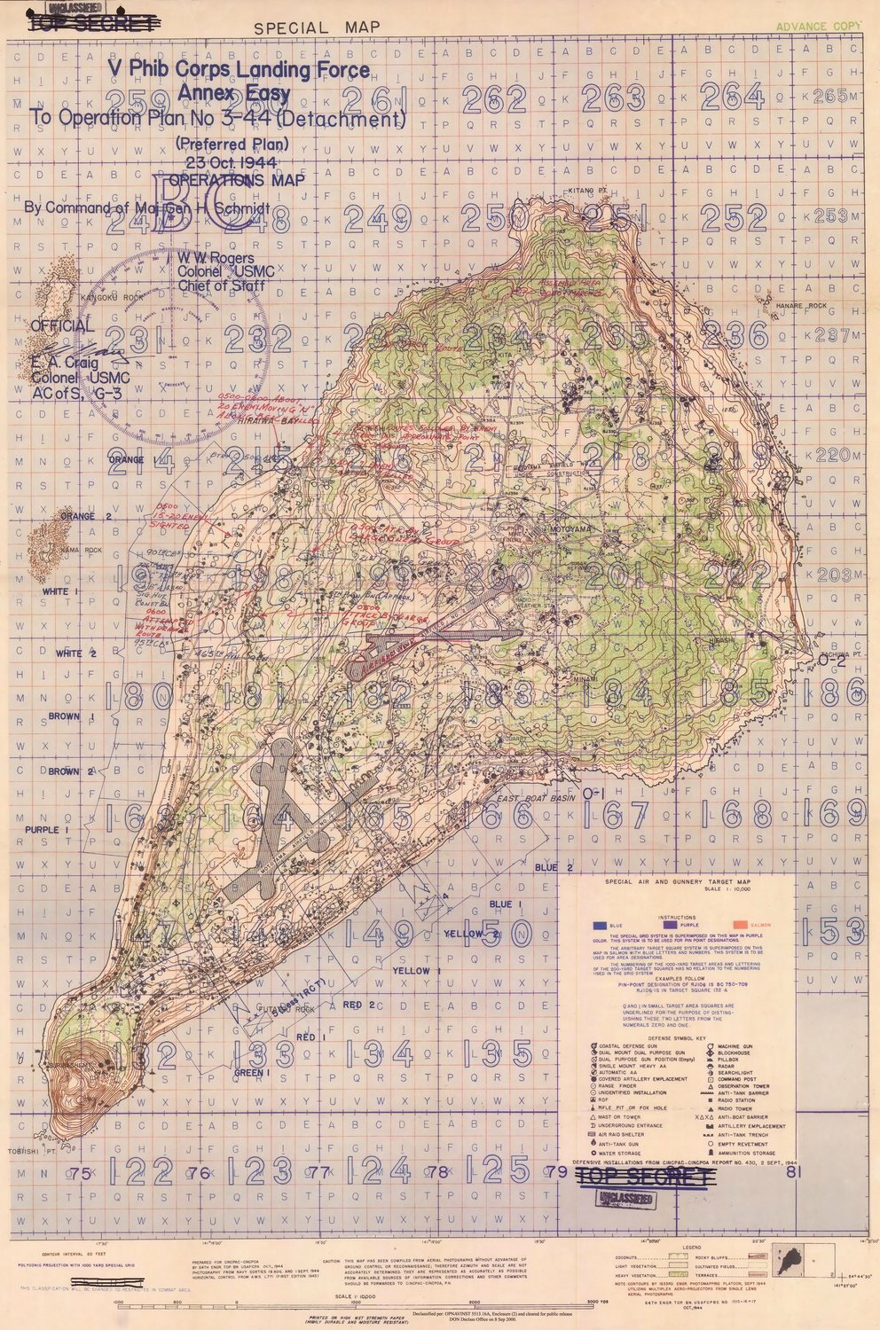 Gridded military map of the pear-shaped island of Iwo Jima with defence symbols and a legend