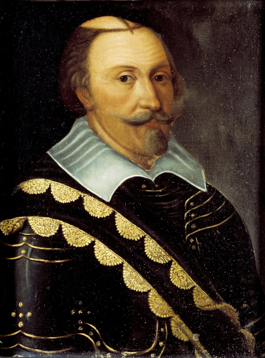 Portrait of a bearded king in black armour with a white collar and gold sash