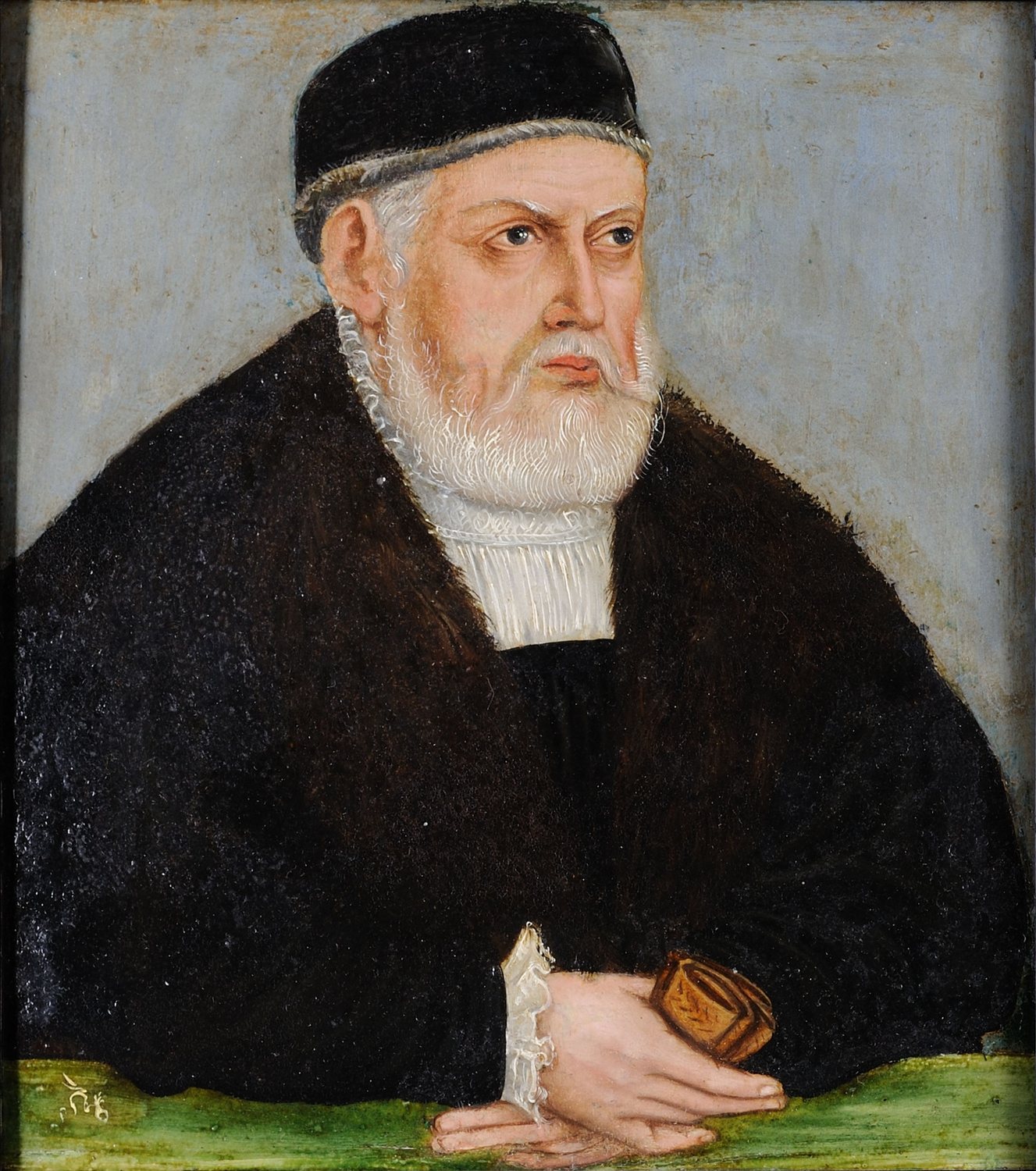 Portret starszego siwobrodego króla w czarnej czapce i futrze