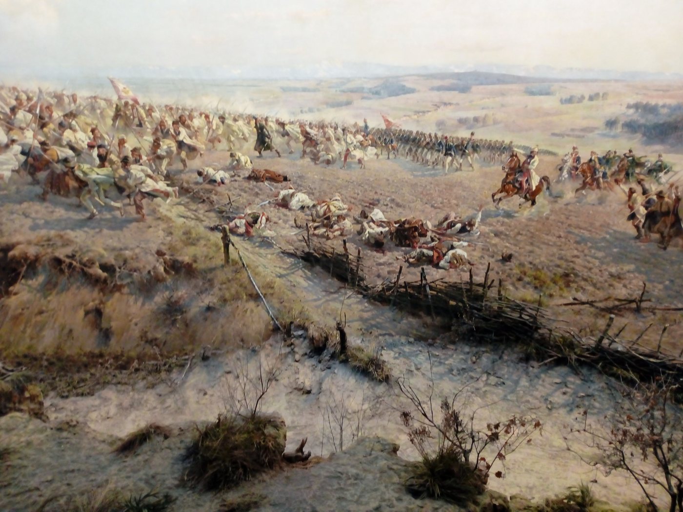 Wide painted battle scene of peasants and soldiers charging across a field with a real foreground