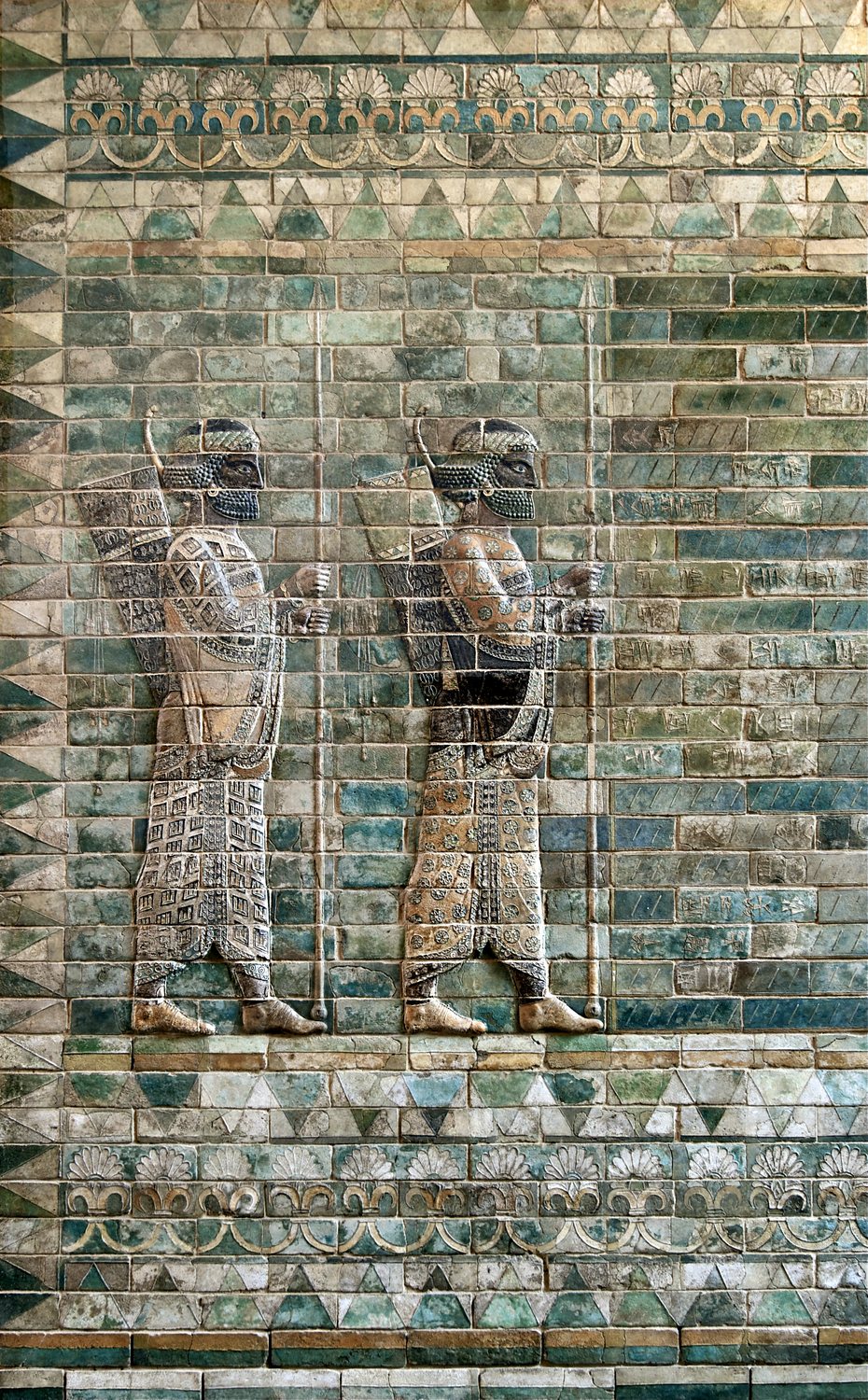 Two Persian guardsmen with spears and bows on a frieze of glazed bricks
