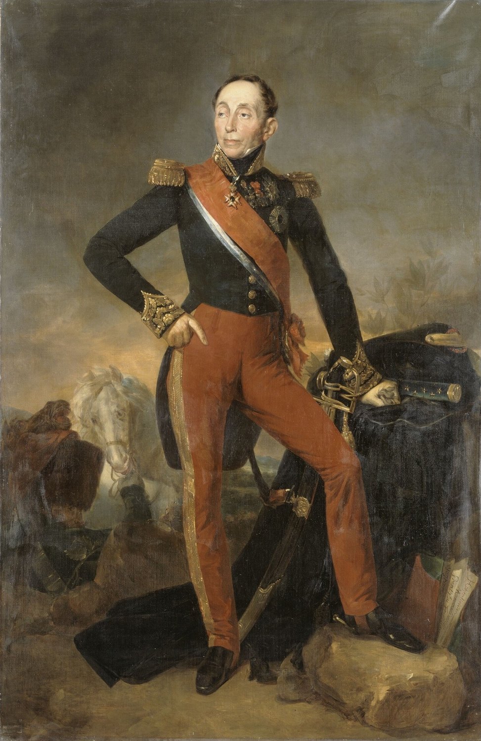 Full-length painted portrait of Marshal Grouchy in a dark blue coat with gold epaulettes, a red sash and red trousers, his hand on his hip and a white horse behind him