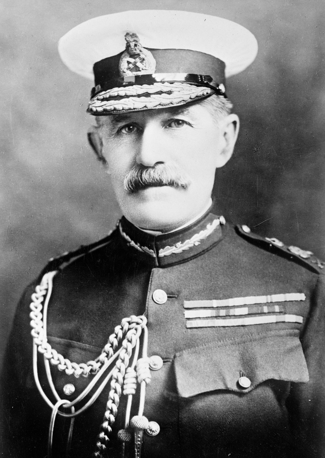 Black and white portrait photograph of a moustached British general in uniform