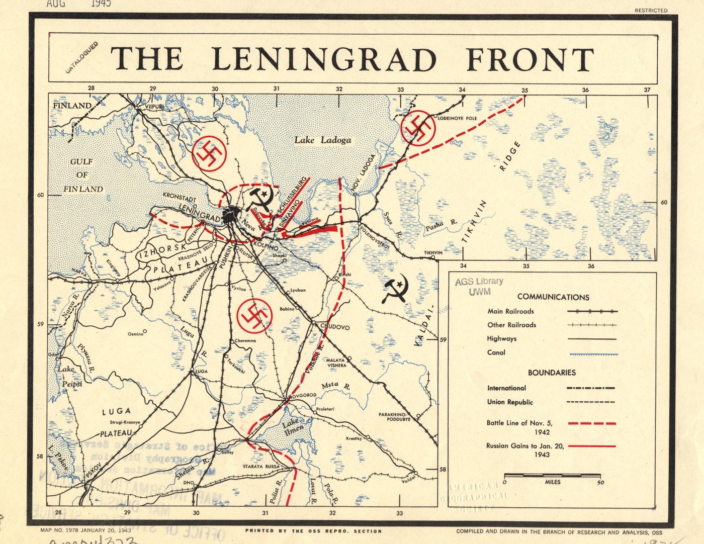 Wartime map titled The Leningrad Front, showing Leningrad, Lake Ladoga, railroads and the battle line of November 1942 in dashed red, with the German and Soviet sides marked by their emblems.