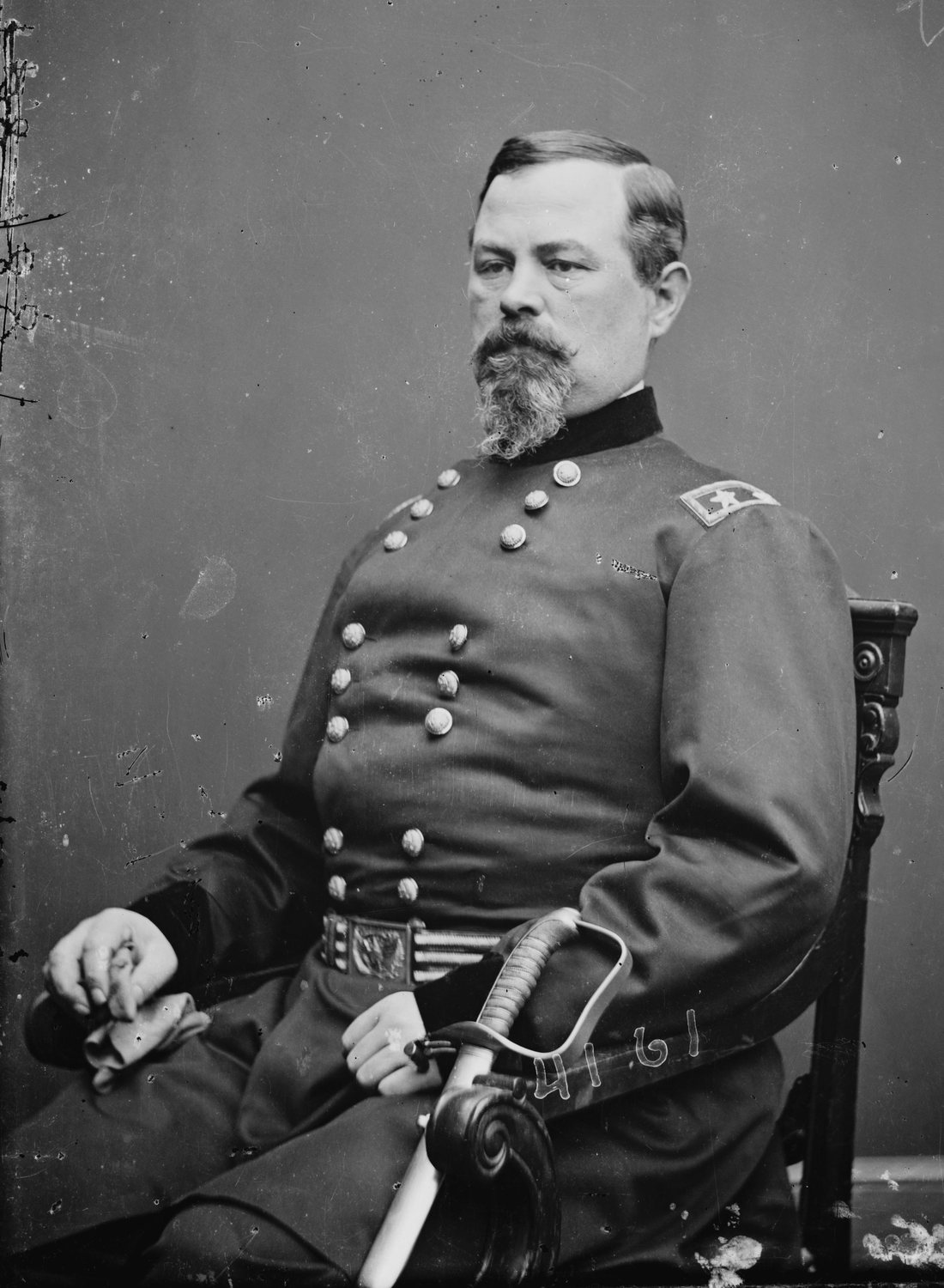 Black and white portrait photograph of a heavy-set Union general in a double-breasted uniform