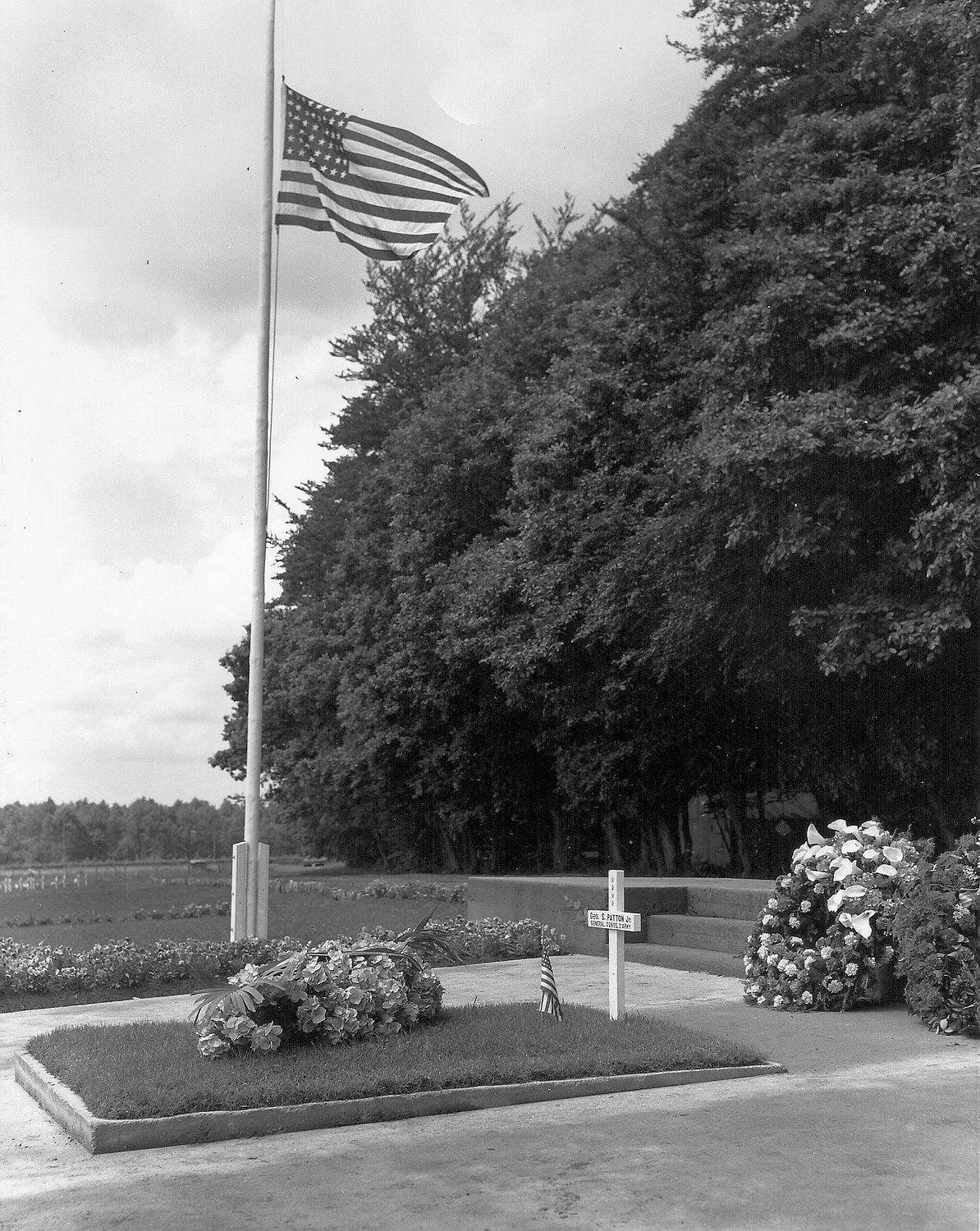 White cross marking Patton's grave in a military cemetery
