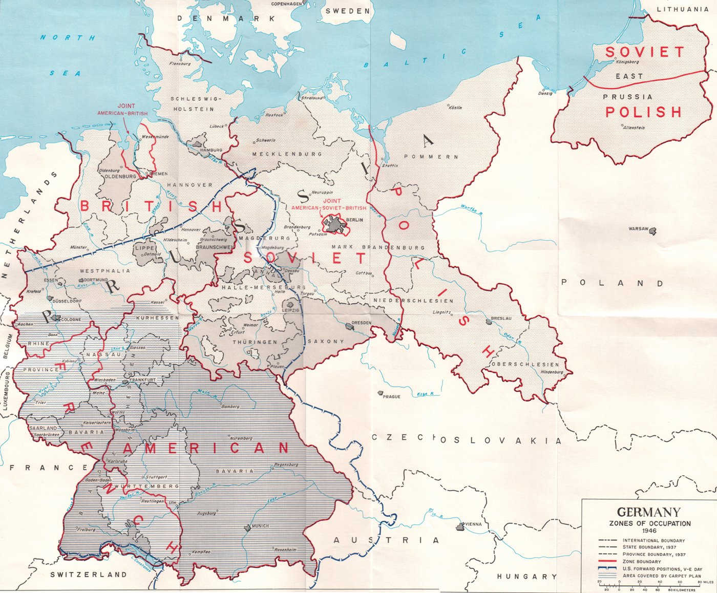 Map of Germany in 1946 divided by red lines into British, American, French and Soviet zones of occupation, with the lands east of the Oder and Neisse marked Polish and northern East Prussia marked Soviet.