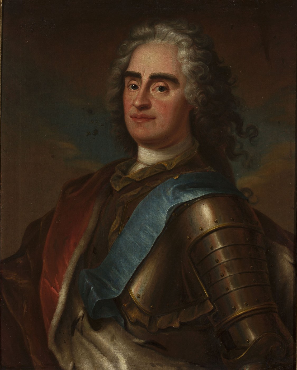 Portrait of a man with dark heavy eyebrows and a long curled wig, wearing polished armor, a red ermine-lined cloak and a pale blue sash across his chest.