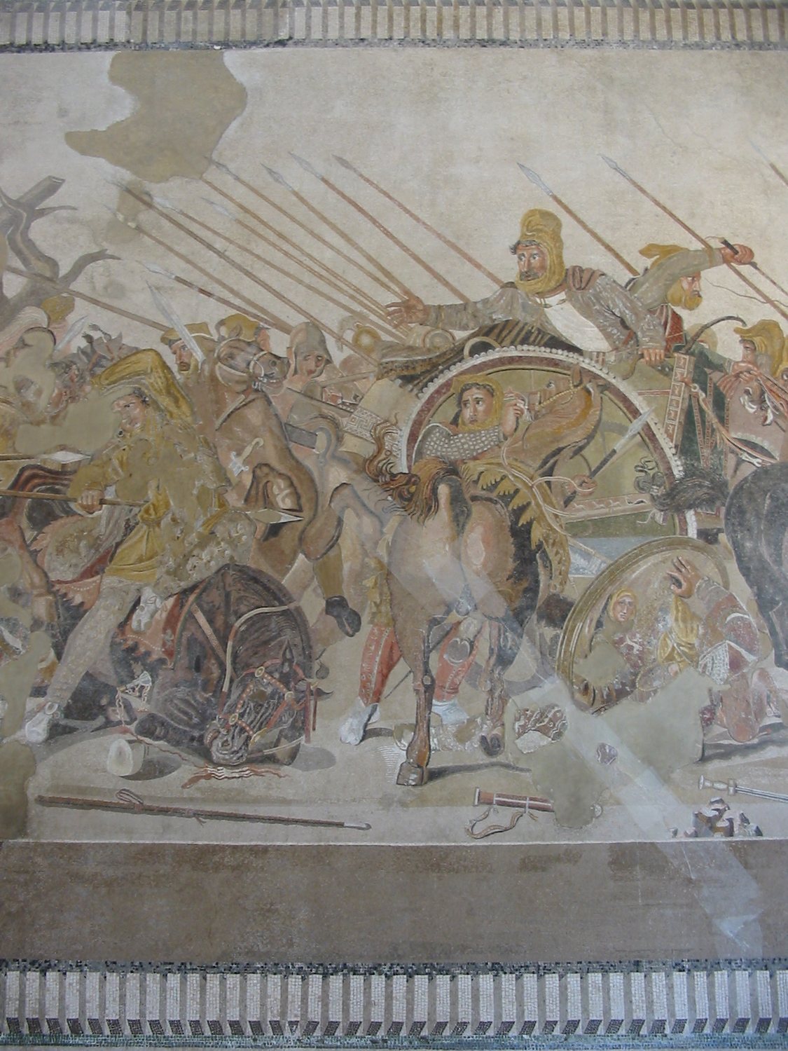 Roman mosaic of a battle with a Persian chariot and horsemen