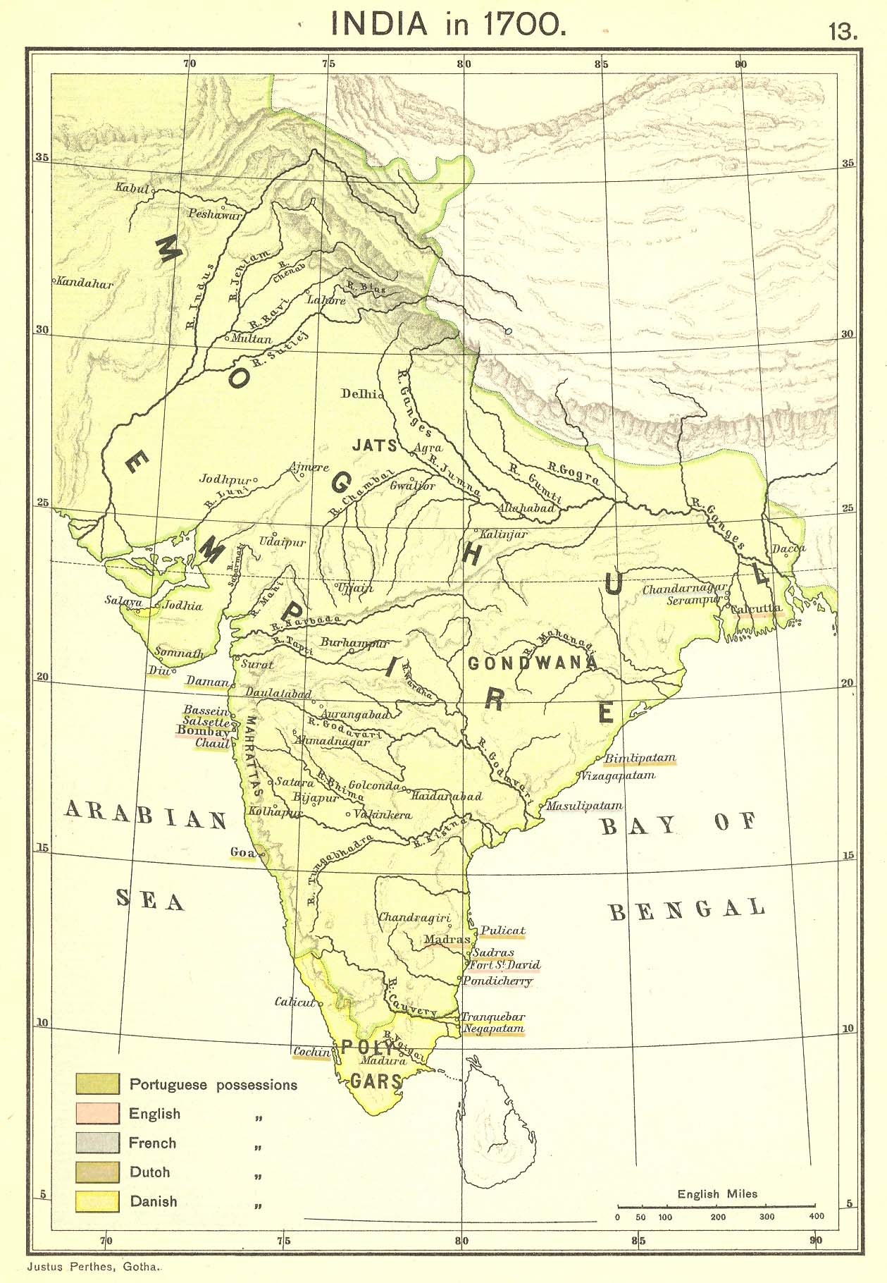 Colored historical map of the Indian subcontinent in 1700, with the words Mogul Empire printed in large letters across almost the whole of it, the Mahrattas named on the western coast, the Poligars in the far south, and small colored patches for Portuguese, English, French, Dutch and Danish possessions on the coasts.
