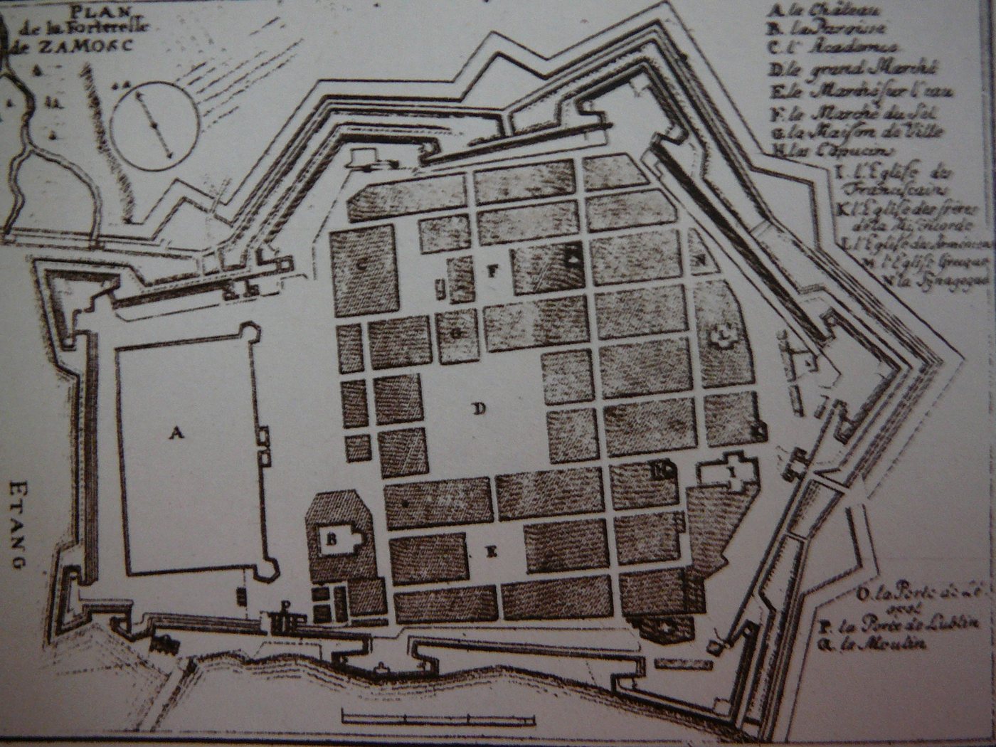 Old engraved plan of a fortified town with a regular street grid and star-shaped bastions
