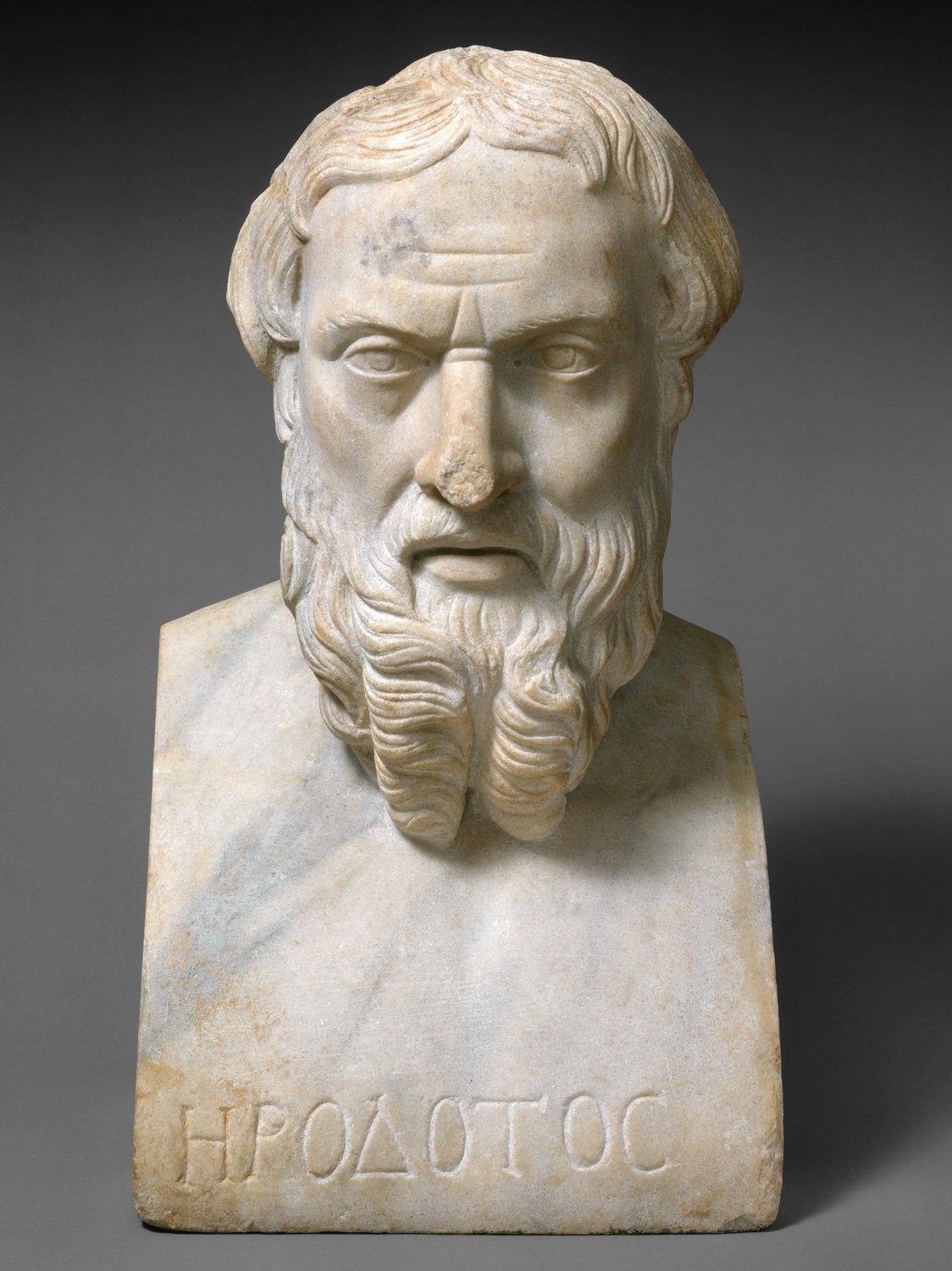 Marble bust of the bearded historian Herodotus inscribed with his name in Greek