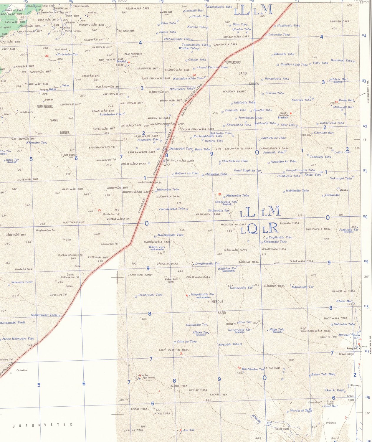Section of a 1955 US Army topographic map with a red border line between West Pakistan and Rajasthan, sand dune country, wells and the places Tanot, Ghotaru and Ramgarh