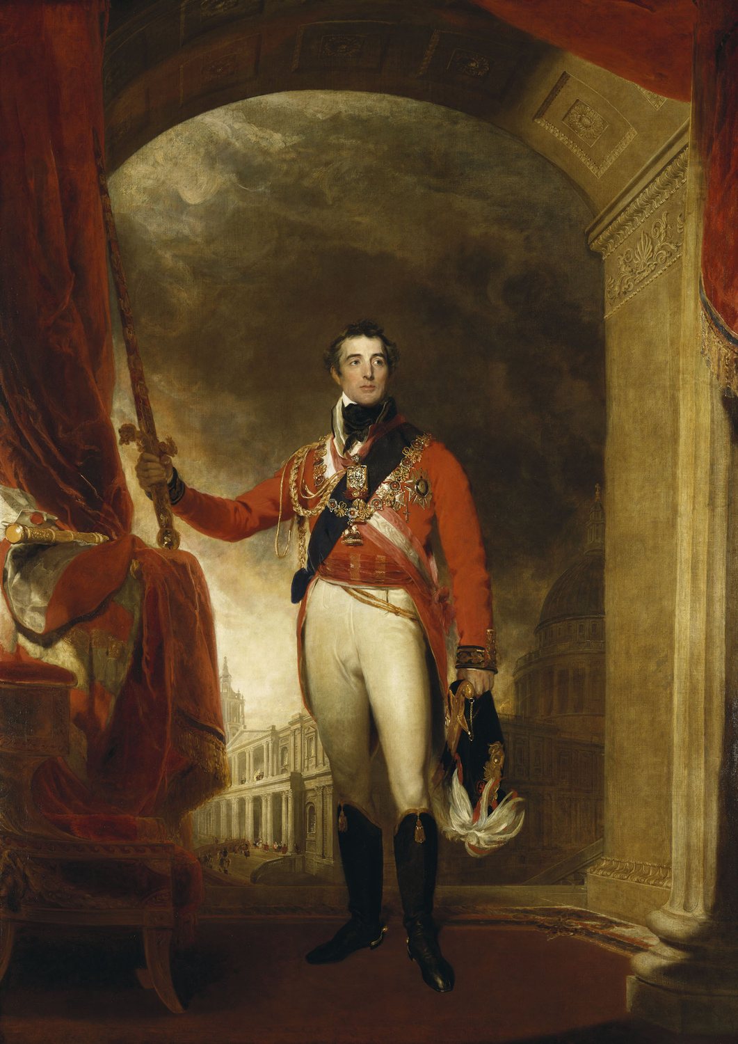 Full-length portrait of Wellington in a red field marshal's uniform holding a sword