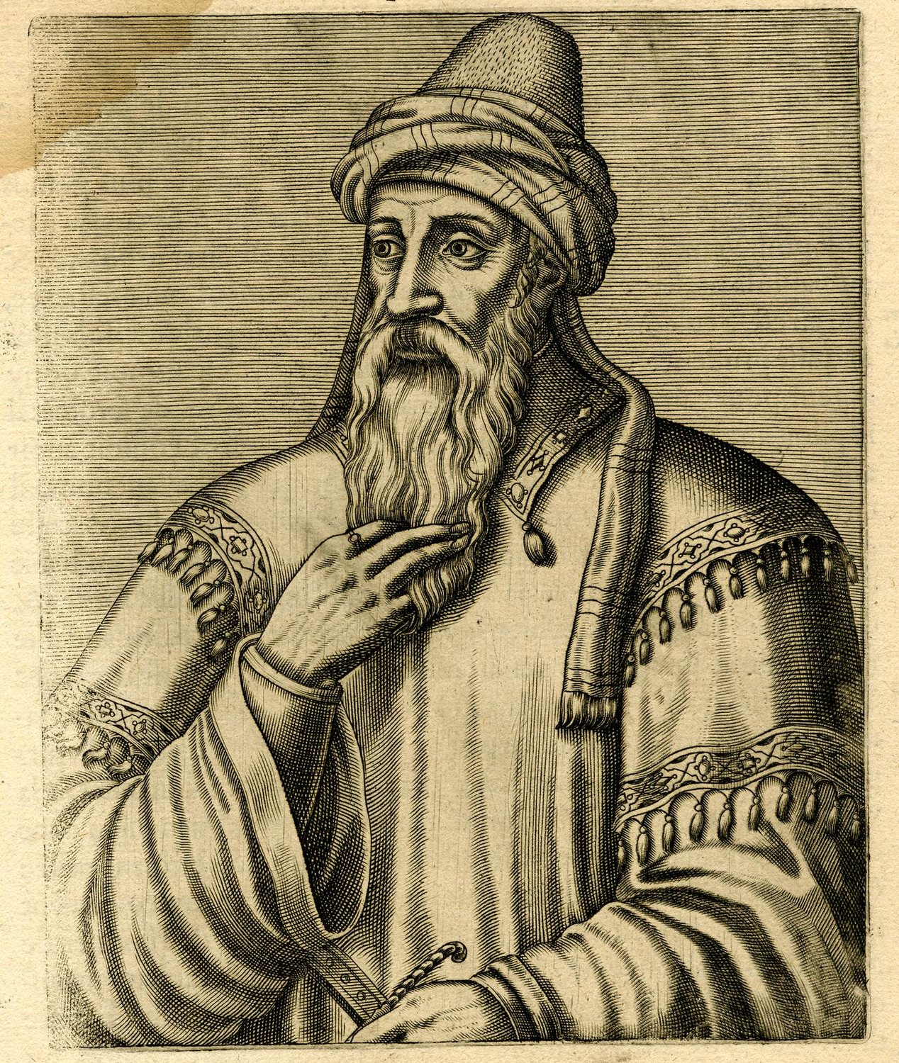 Engraved half-length portrait of a bearded man in a turban touching his beard