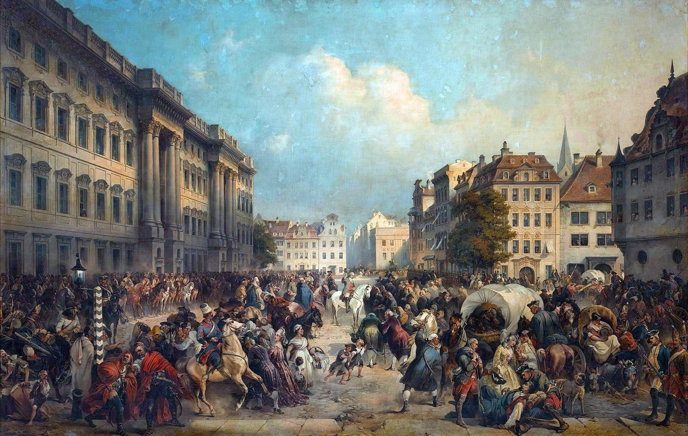 Painting of a crowded city square lined with palaces: Russian officers on horseback, one raising his hat, ride into a throng of townspeople, soldiers, women and children, while bareheaded citizens bow before them and wagons stand at the right.